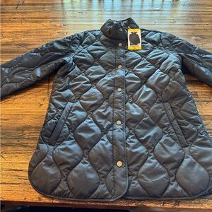 NWT. 32 Degrees Women’s Quilted Jacket. Size Small. Color is Navy.